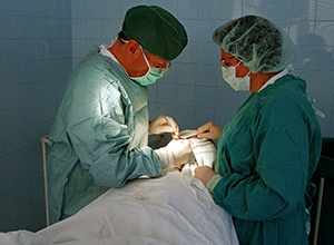 doctors operating on a patient